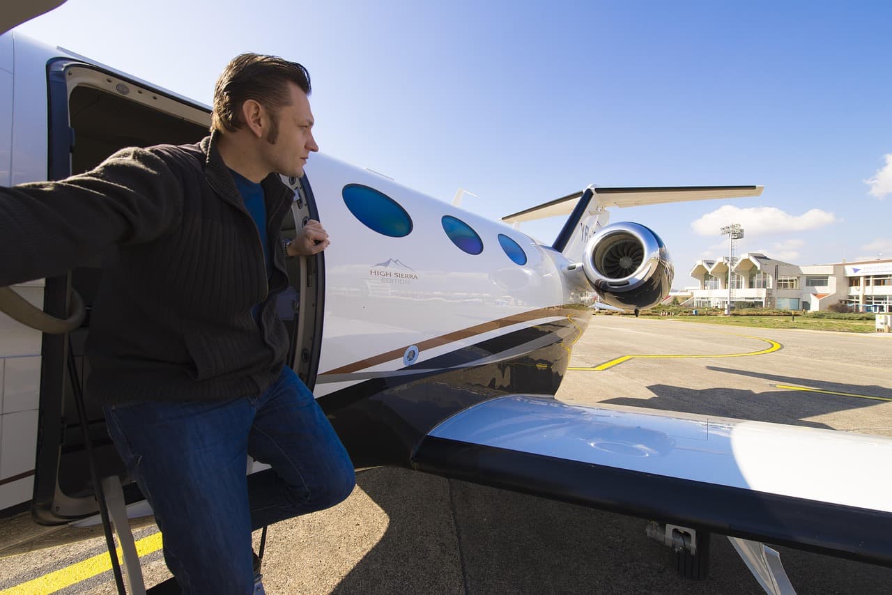 A client stepping onto a private aircraft